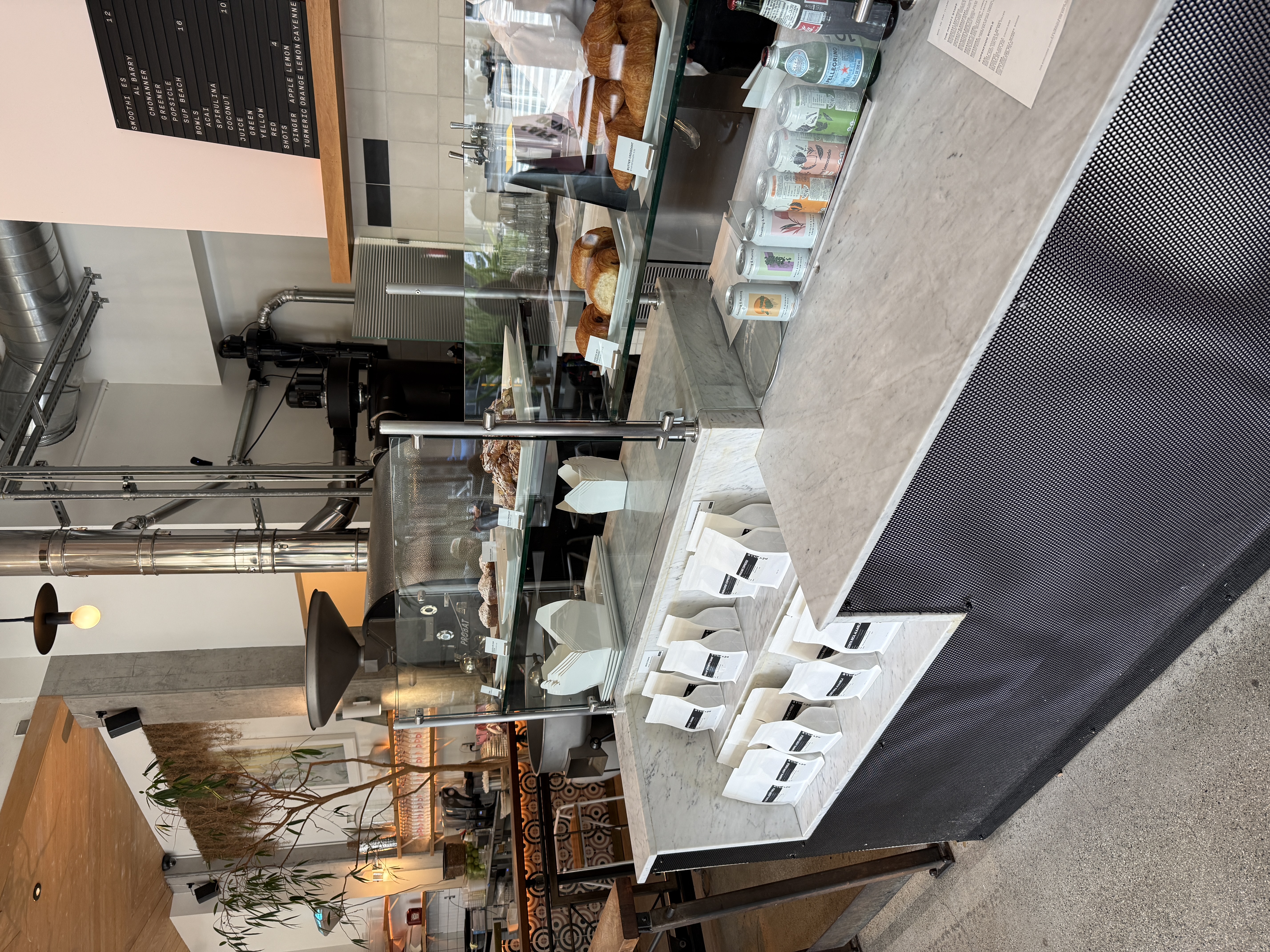 Flat white and pastry at Café Réveille