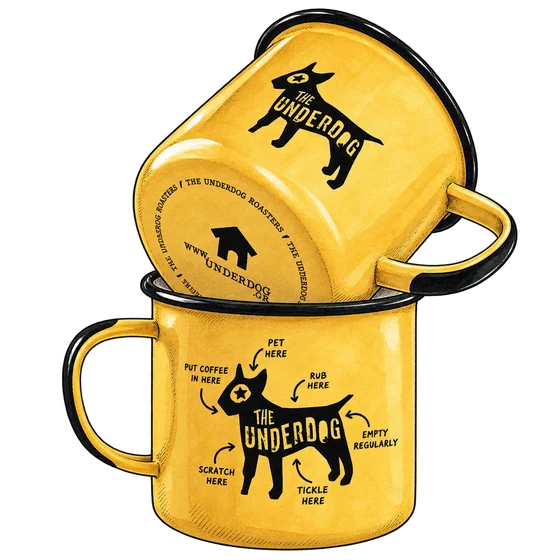 Two yellow enamel mugs with black rims and The Underdog dog logo, one tilted inside the other